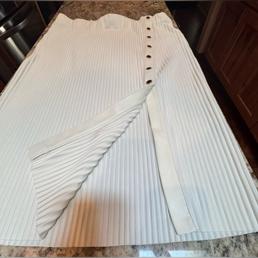 NWT. Marc New York cream colored pleated skirt with gold buttons.